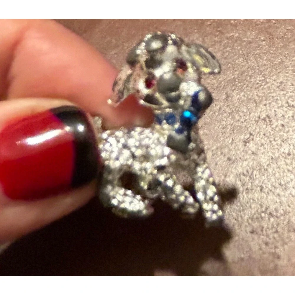 Unmarked‎ Silver Tone Lamb Pin or Brooch Red Rhinestone Eyes Blue Bow